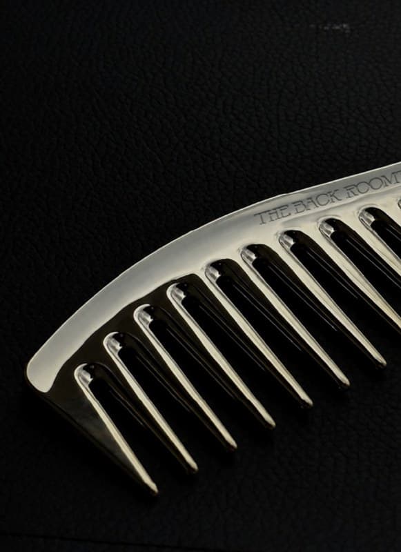 Pearl-white comb on black
